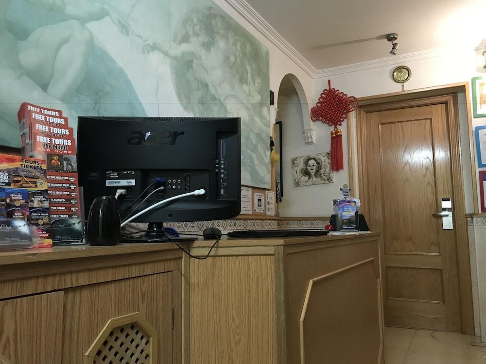 Rc Miguel Angel Hostel Madrid Exterior photo Reception desk at the hotel